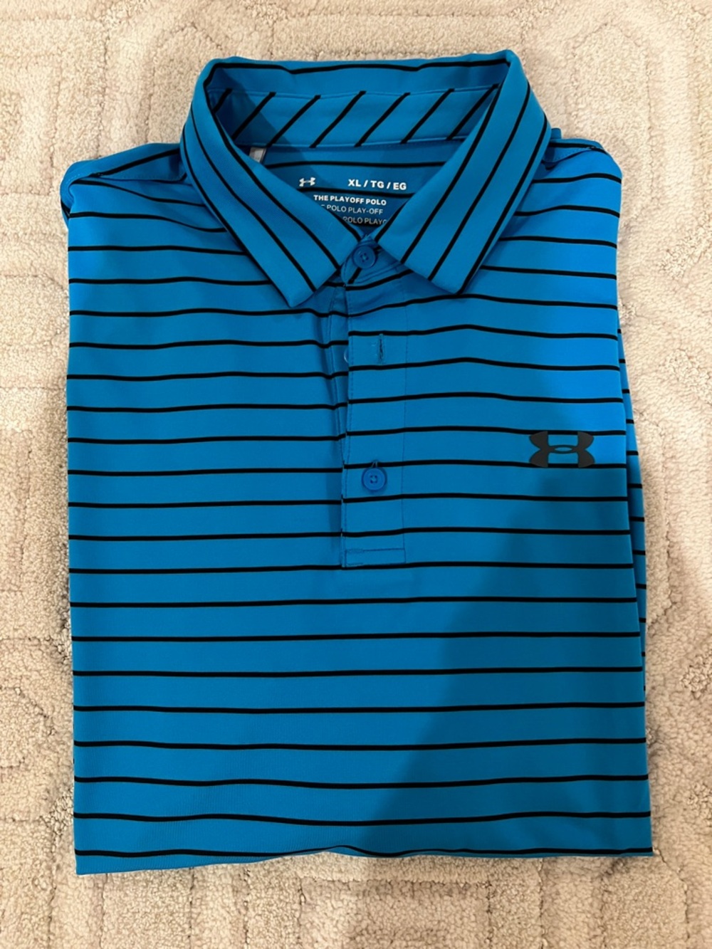NWOT Under Armour Men’s Blue PERFORMANCE/golf Polo with Black Stripes